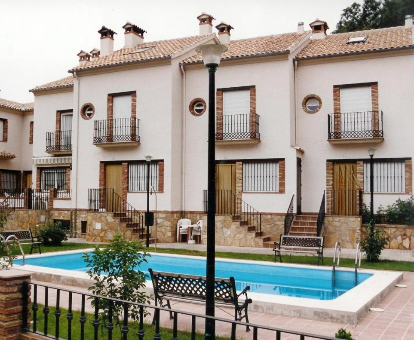 Foto de Villa Casa El Aplauso donde se observa su piscina y la villa