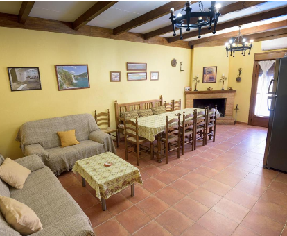 Foto de la sala de estar de Villa casa rural Alonso Quijano