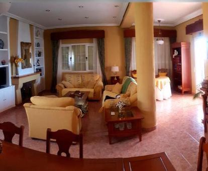 Foto de la sala de estar de Villa La casa de Polito